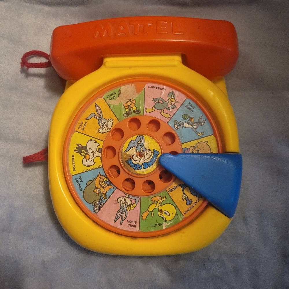 Vintage 1978 Mattel Looney Tunes Spin Toy - Yellow, Orange, Blue